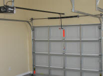 Garage doors and openers should be handled safely.